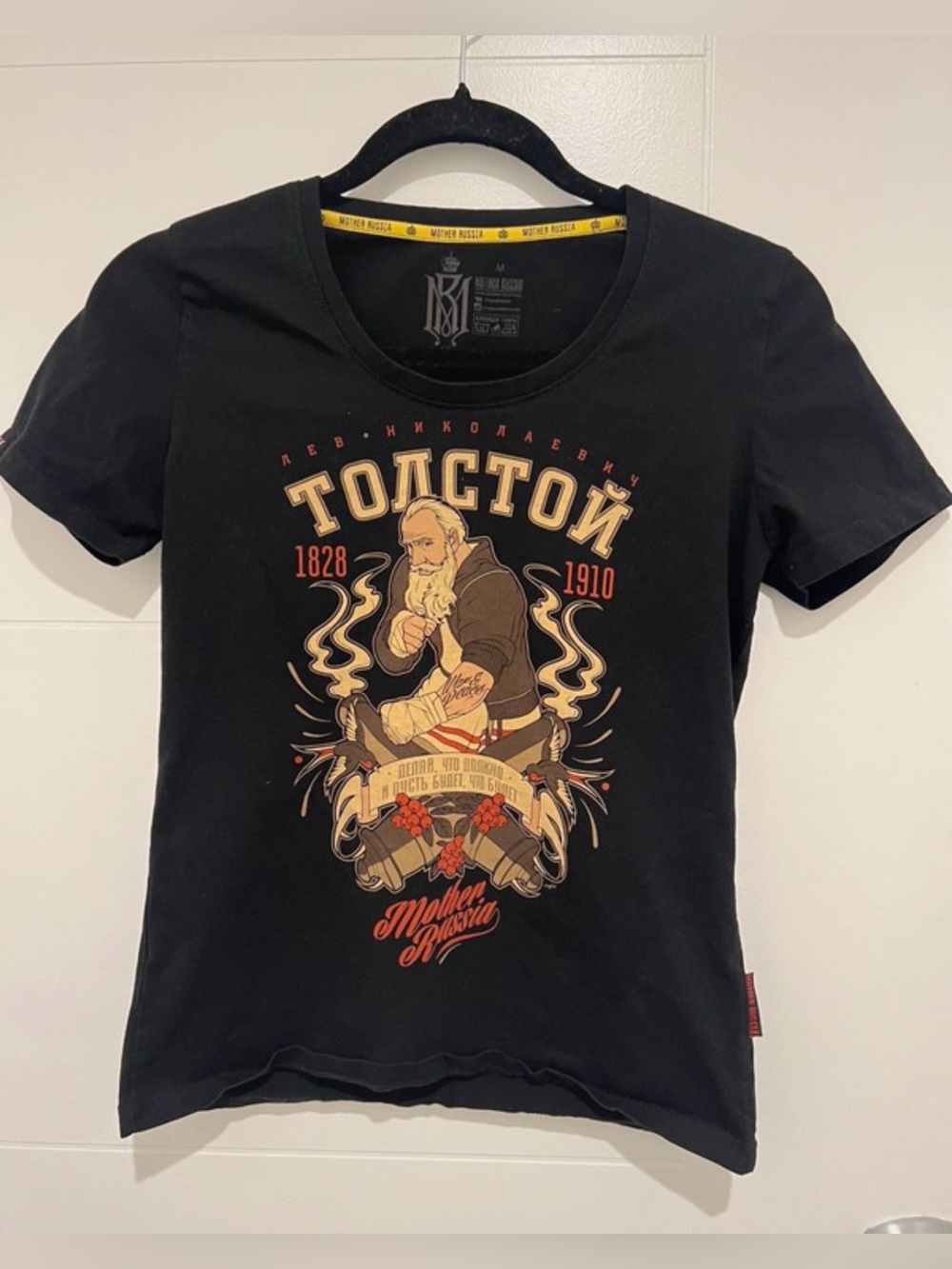 Black Graphic Tee featuring Tolstoy Artwork